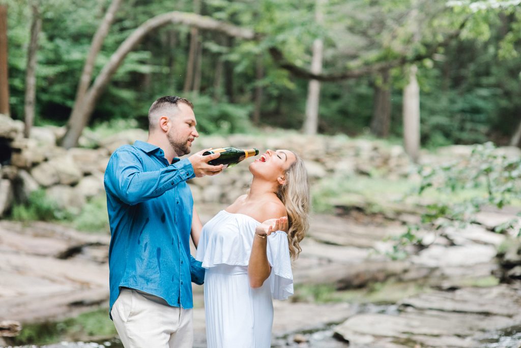 champagne toast at minnewaska engagement session