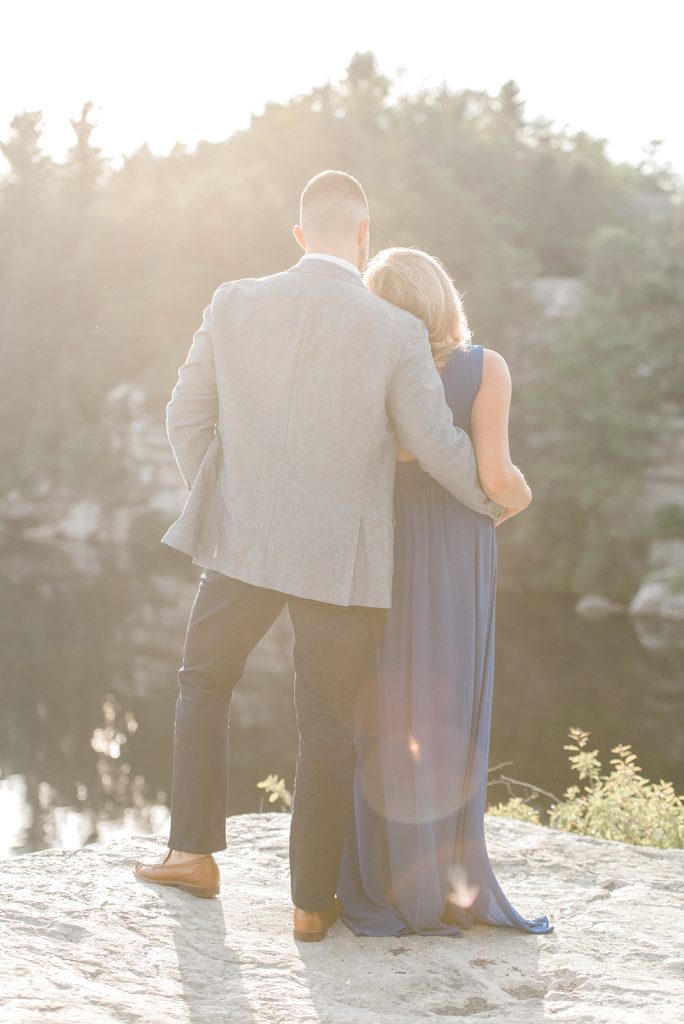 romantic snuggle on mountain at hudson valley engagement
