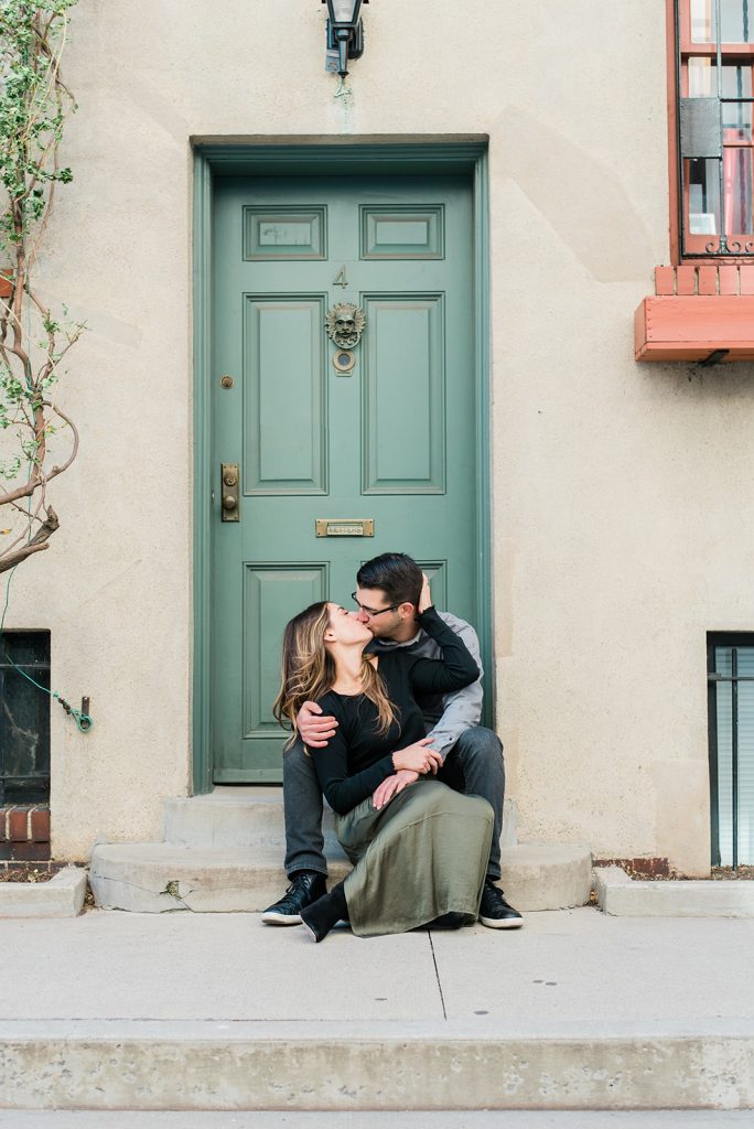 romantic kiss outside nyu dorms during nyc engagement session