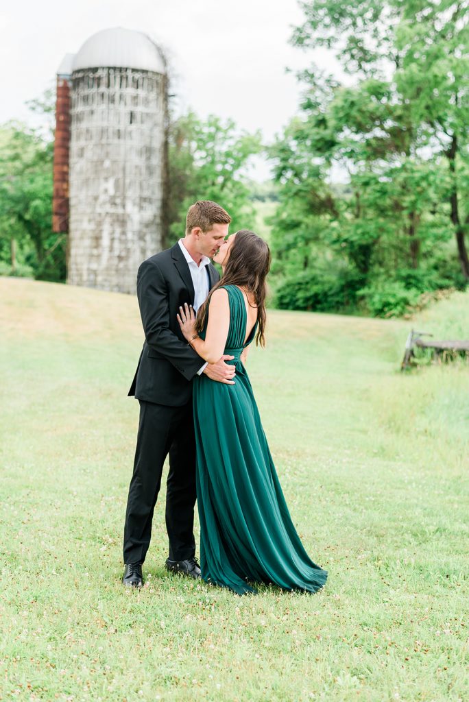 kiss of couple during farm engagement session