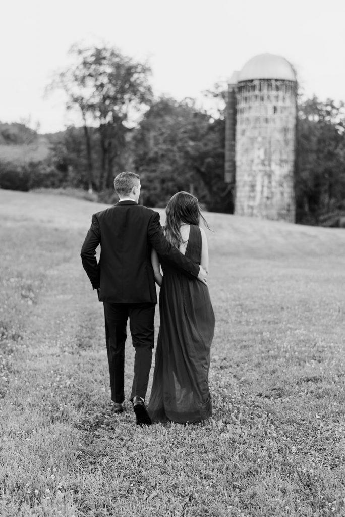 couple on warwick farm with silo in engagement session
