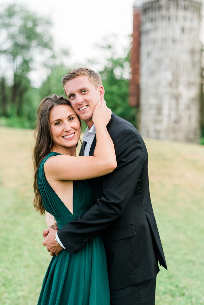 couple poses for camera during engagement pictures