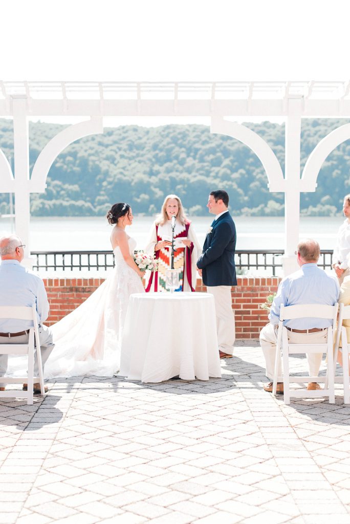 bride and groom recite vows during grandview wedding