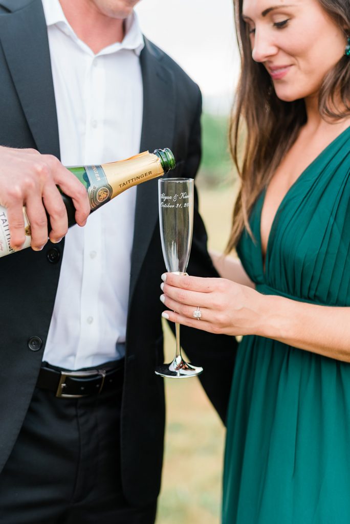couple enjoying champagne during shoot
