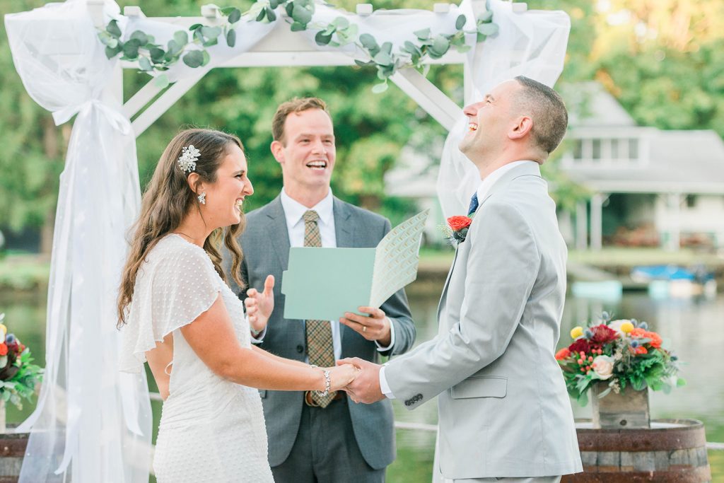 couple has a laugh during hudson valley elopement ceremony