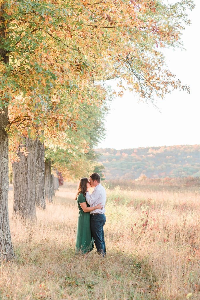 couple share a sweet kiss during new paltz engagement session in new york