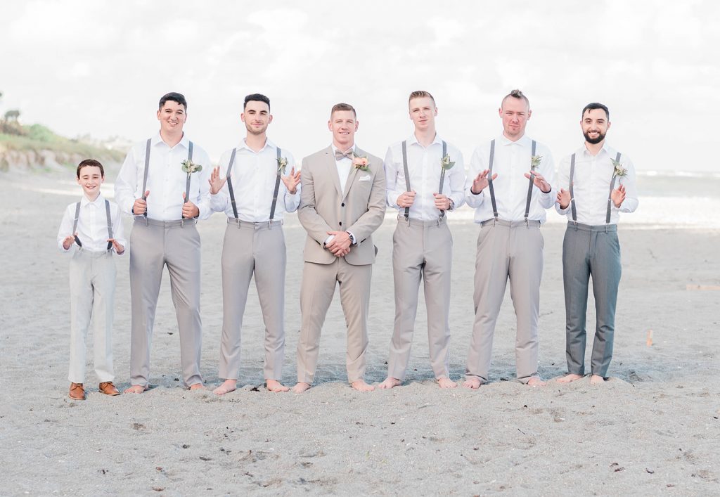 groom and groomsmen during candid portrait