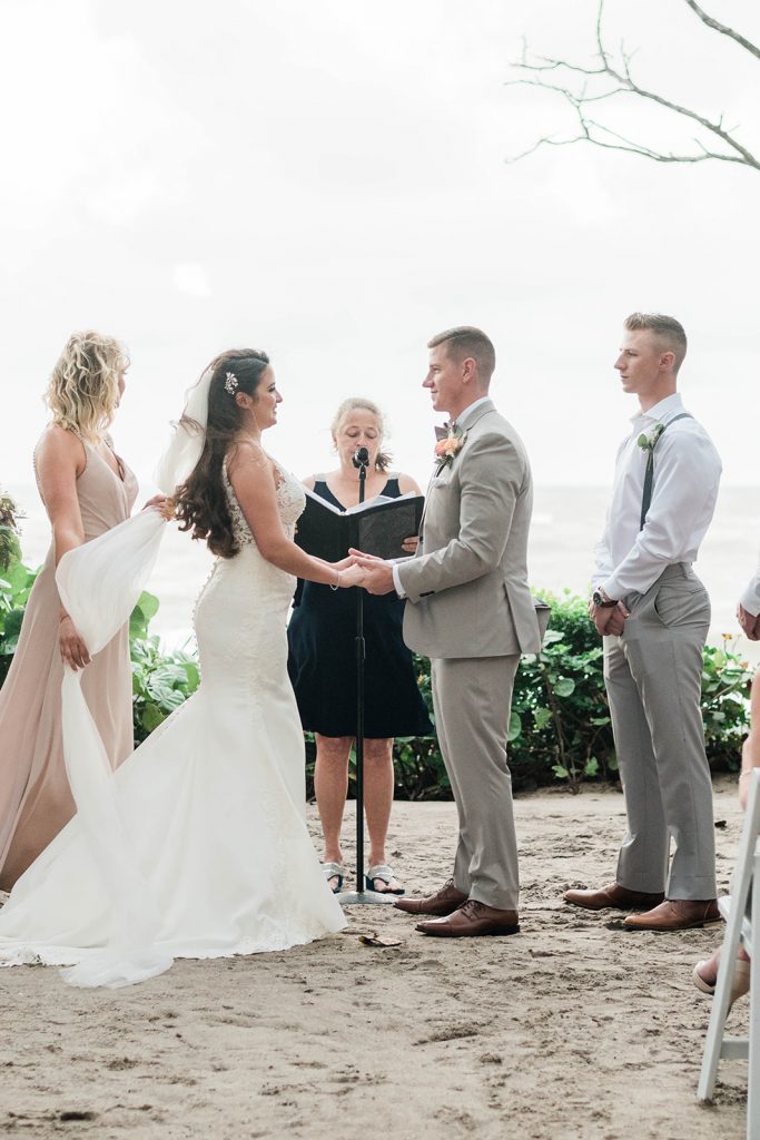 couple stares at each other as they exchange vows