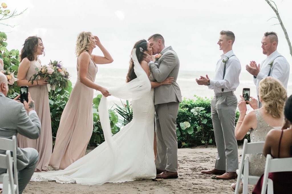 ceremony kiss during beach wedding