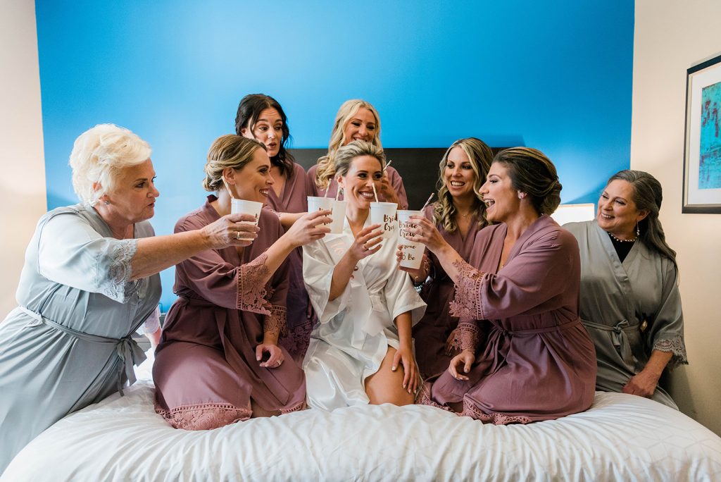 bride toast with her bridesmaids on wedding day hudson valley