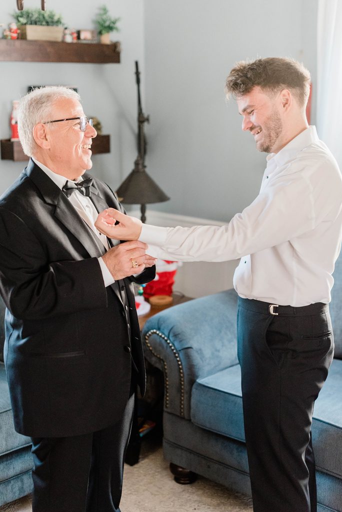 dad helps his son get ready for new jersey wedding