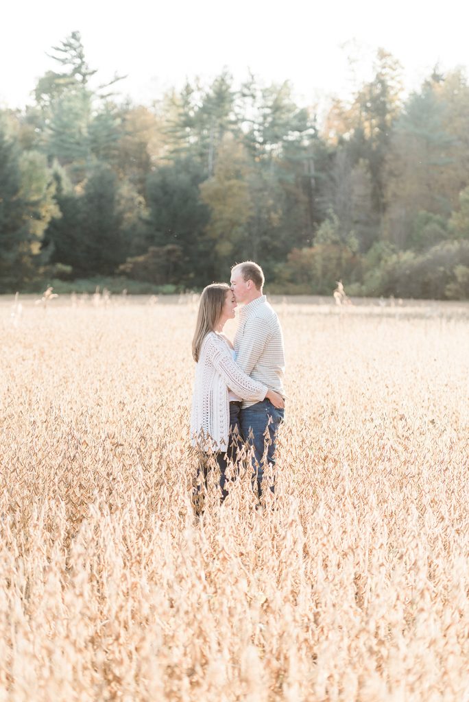 open field shot of couple during engagement pictures