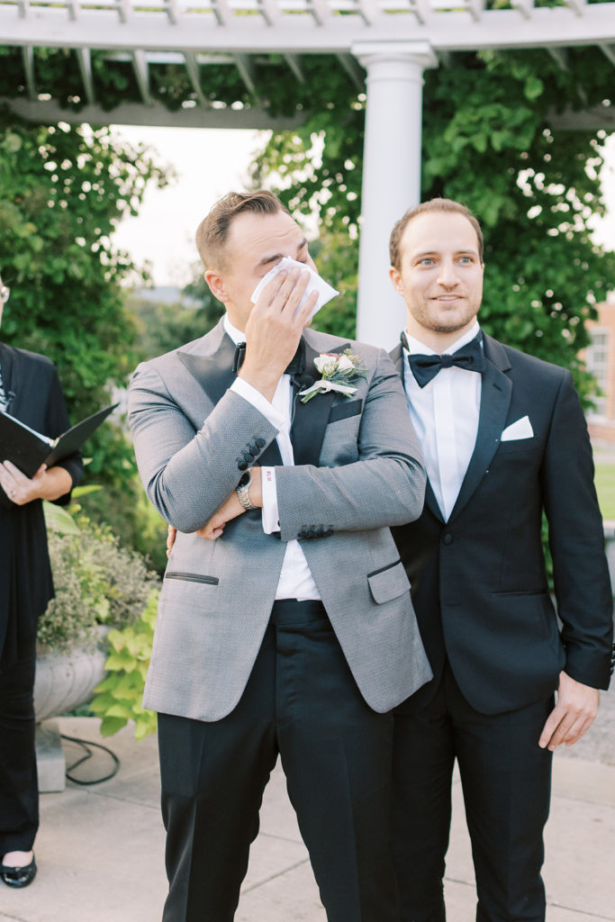groom having emotional moment