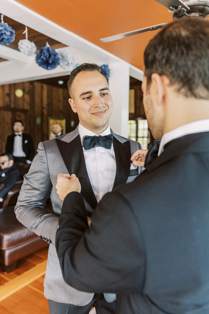 groom gets ready with brother