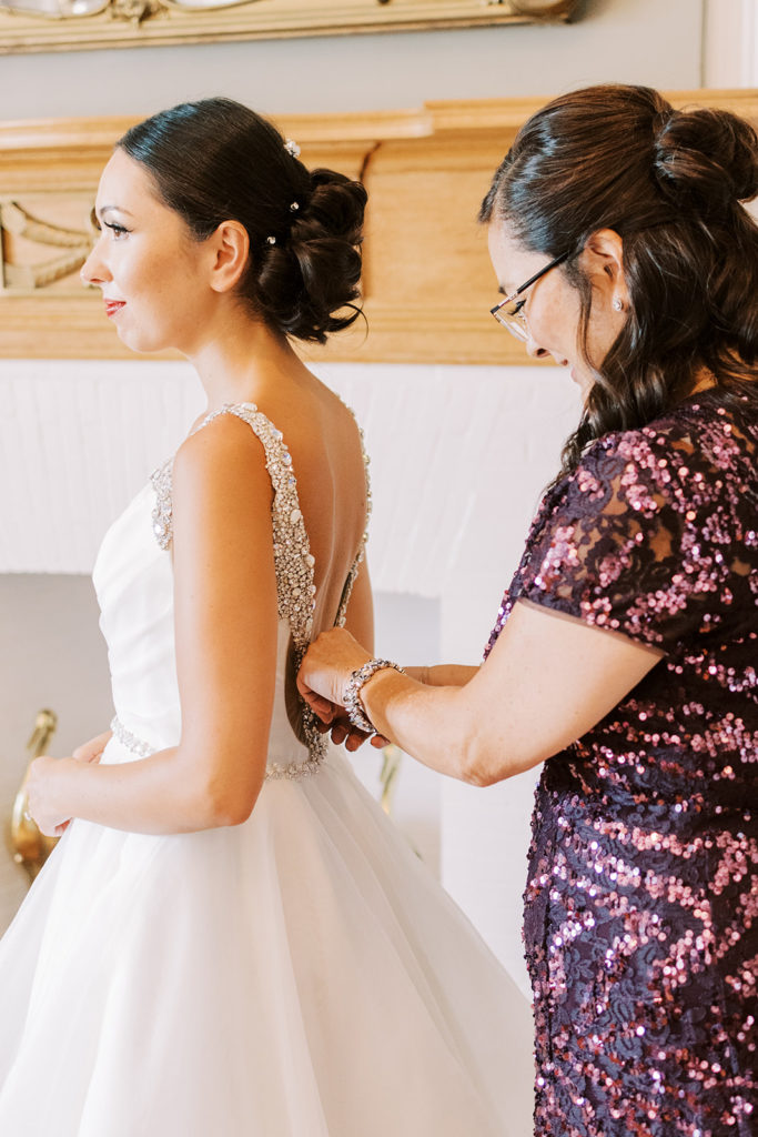 bride gets ready with her mother
