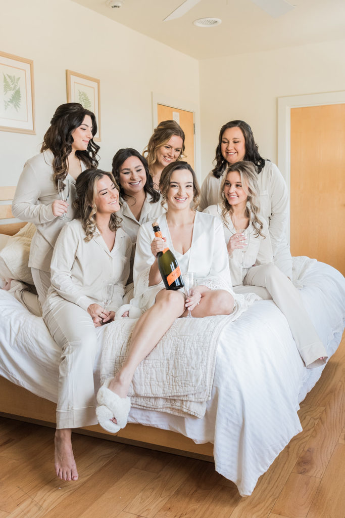champagne toast at the garrison with bride and bridesmaids