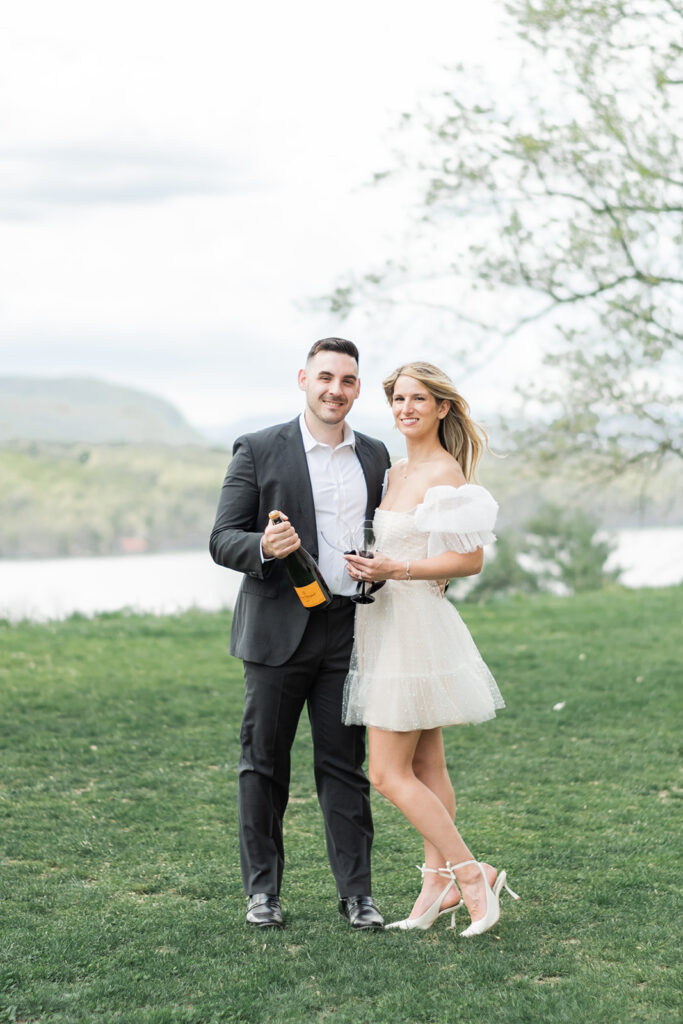 champagne toast overlooking hudson valley mountains
