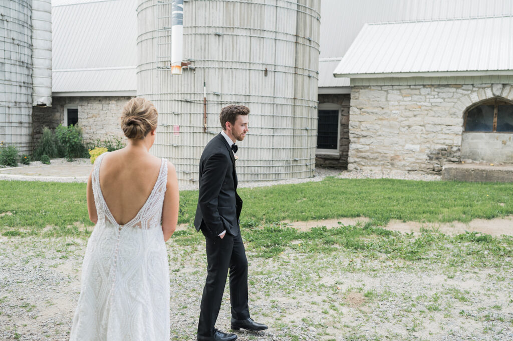 first look at stone barn at beardslee wedding
